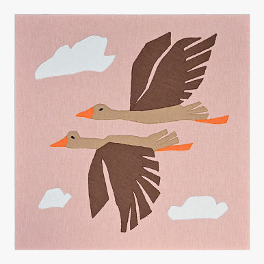 Feature image of a nature inspired nursery decor piece in the form of a textile artwork with flying birds amidst a pink sky with white clouds