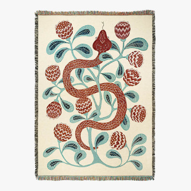 woven cotton throw blanket with a red snake design over an off-white background