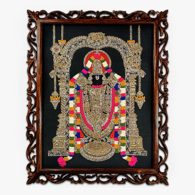 Feature image showcasing Lord Sri Venkteswara in a textile artwork with vibrant colours of gold, pink, red, black and white over a black fabric background; framed in a hand-carved oak wood frame