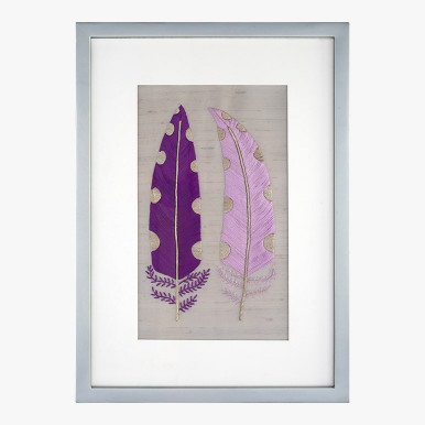 framed feather wall art featuring two purple feathers with silver polka dot in a silver frame