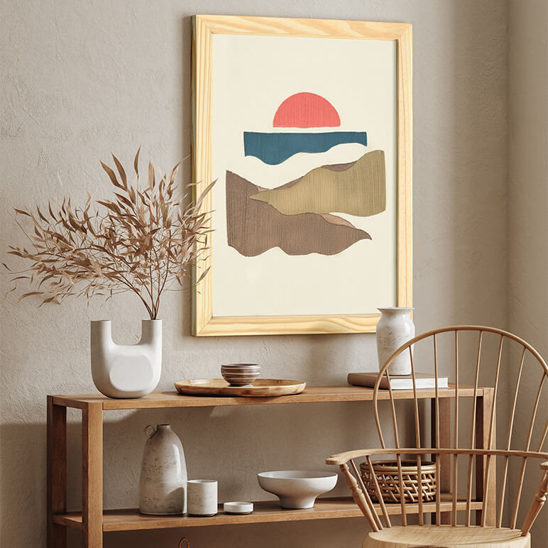 Staged view of an abstract mountain wall art in earthy colors, seen displayed in wood in a neutral colored room