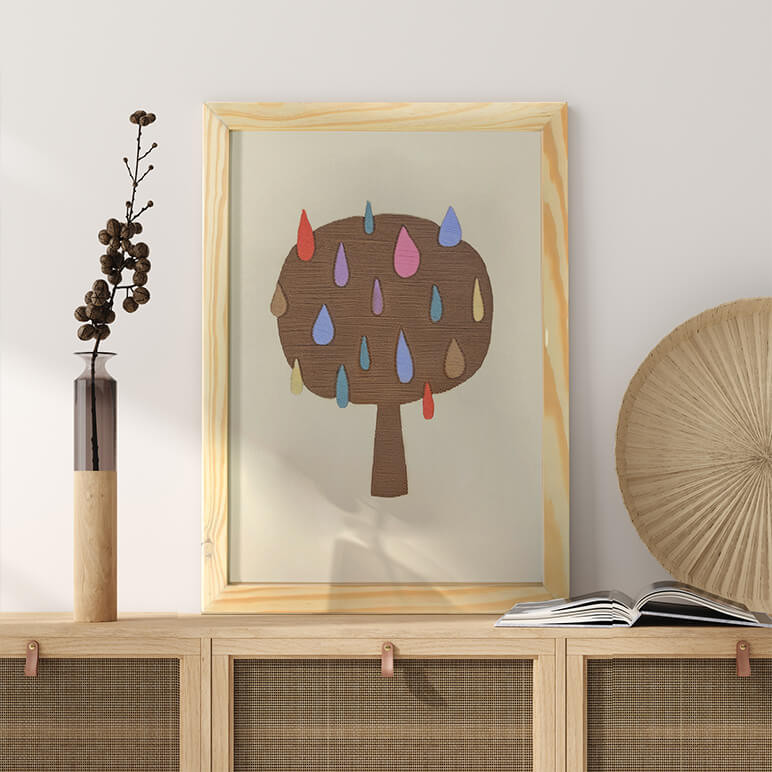Abstract tree work of textile art, displayed in wood over a wooden console table