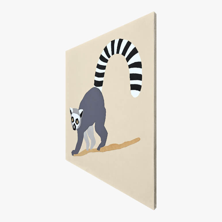 Right angle view of an animal wall decor for kids, featuring a lemur monkey in white and black over beige fabric, canvas framed