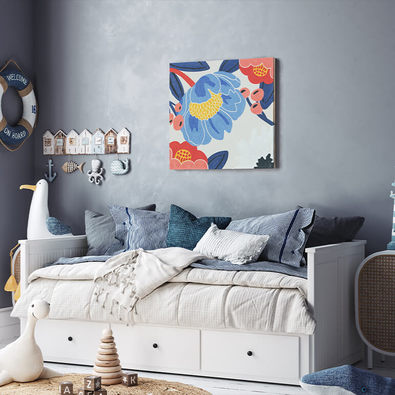 Mood shot of an art with blue flowers seen displayed in a blue modern nursery room