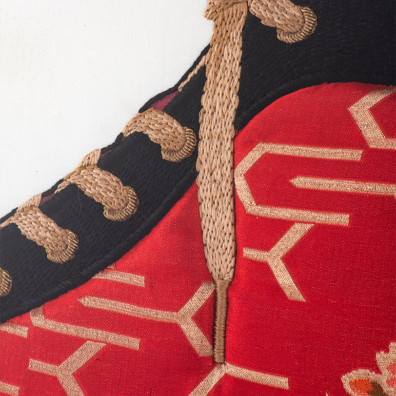 closeup view of embroidery detail on red sneaker art