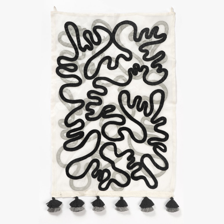 black and white tapestry made of black suede abstract patches on two layers of off-white silk organza