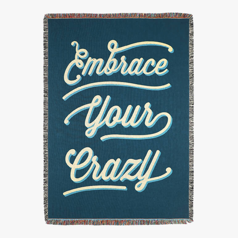 blue throw blanket with the phrase 