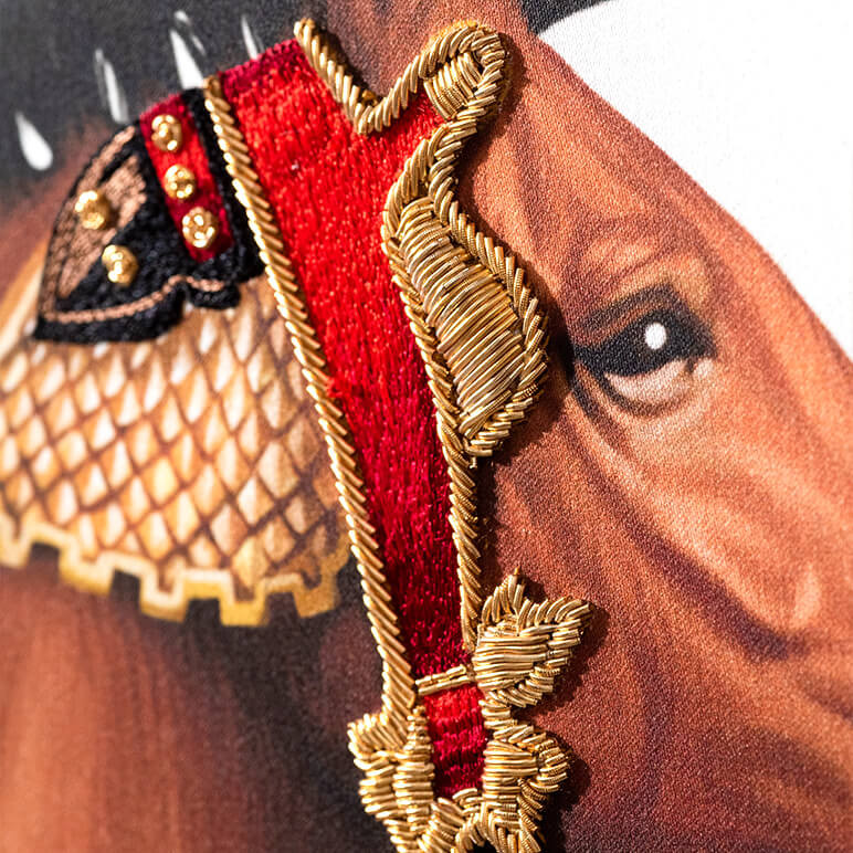 closeup embroidery detail of a carousel horse art showing a detailed view of the embellished horse head