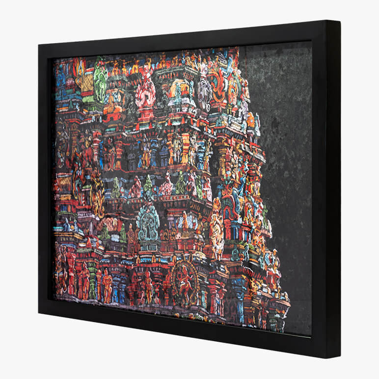 side view of a framed printed velvet fabric wall art featuring an Indian temple in multicolors
