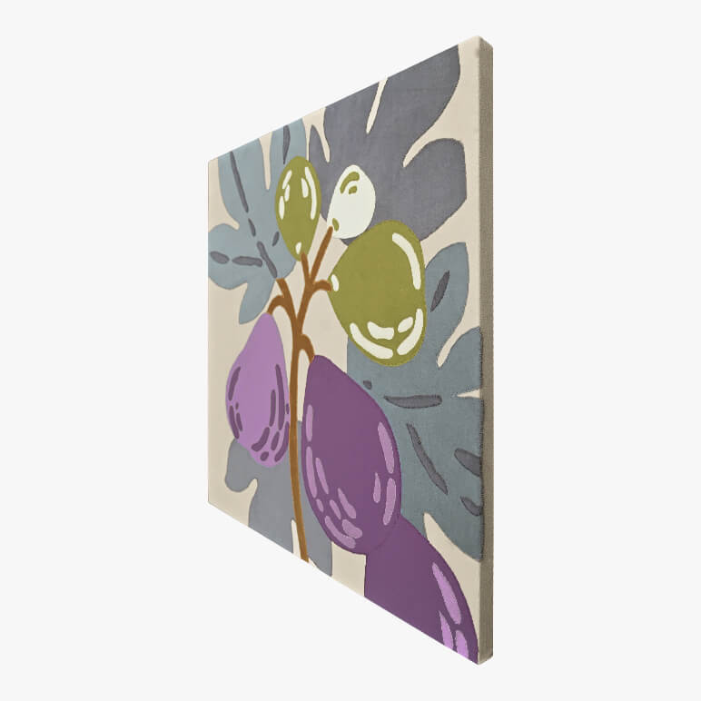 Right angle view of a canvas framed fig tree wall decor piece in shades of violet, lavender, green and grey over a beige fabric background