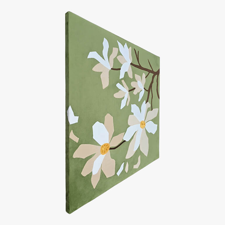 Left angle view of a canvas framed patchwork wall art in green and white color tones showcasing flowers