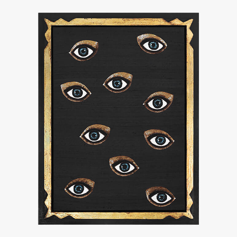 framed glam décor piece in black and gold with a group of embroidered blue eyes