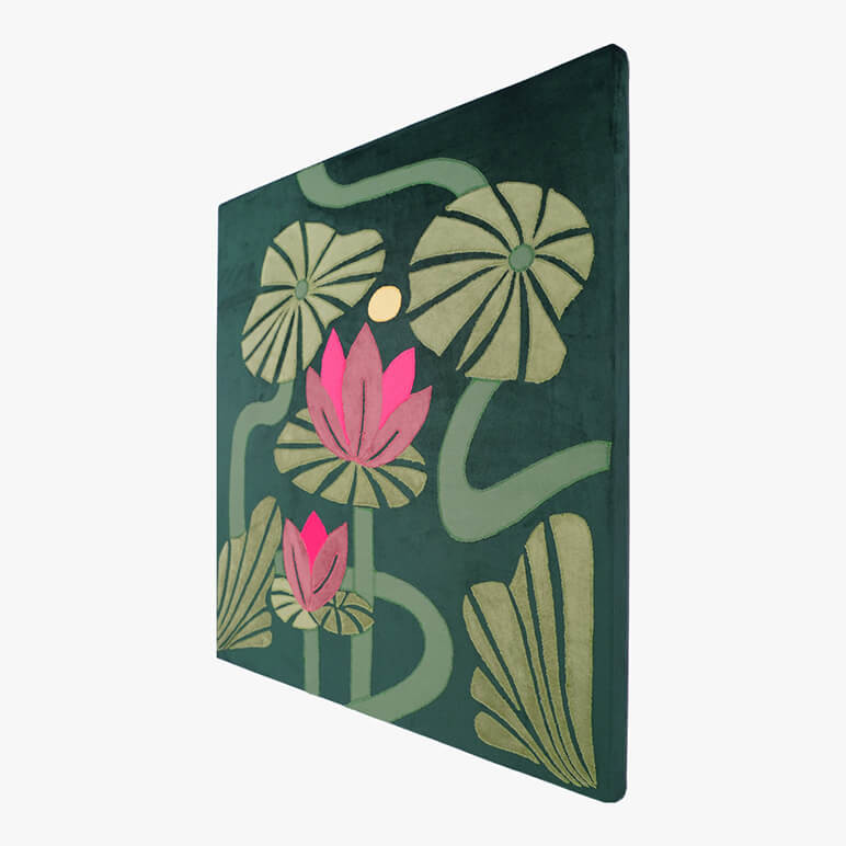 Right angled view of a tropical green artwork, canvas framed, featuring pink lotuses with green stalks over a dark green soft suede background