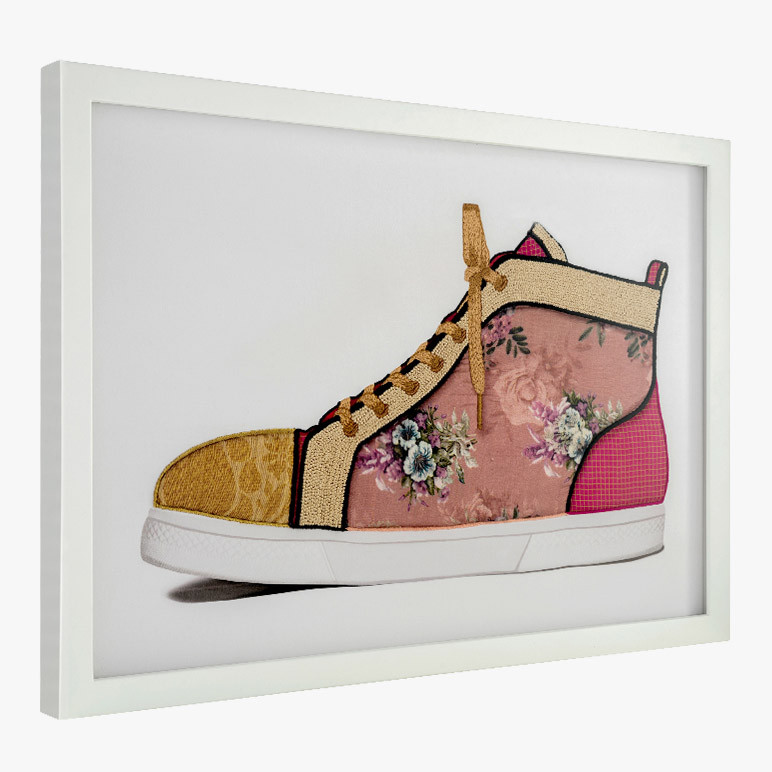 side view of framed mixed media artwork with a pink floral sneaker