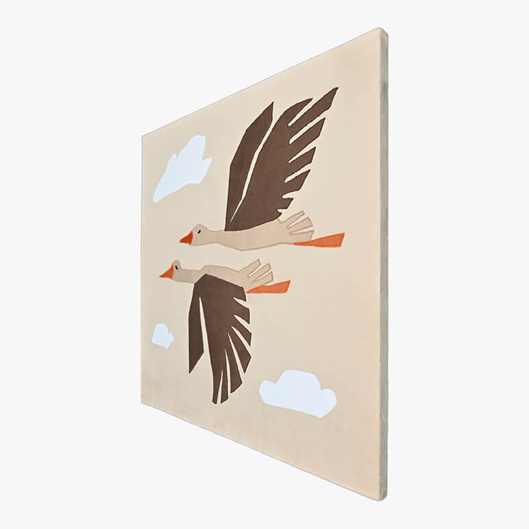 Right angle view of a canvas framed nursery wall art with birds, in earthy colors