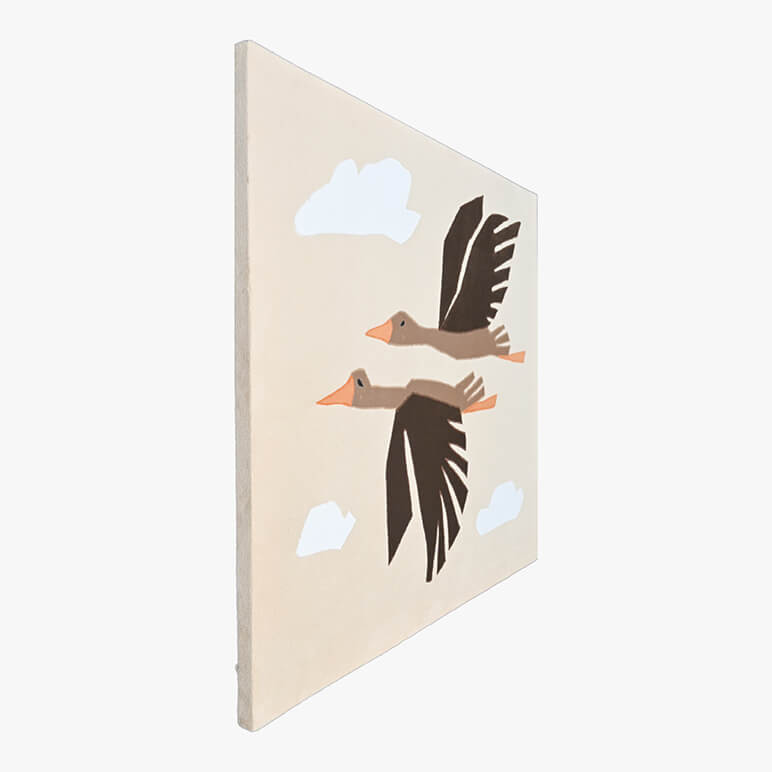 Left angle view of a canvas framed nursery wall art with birds, in earthy colors