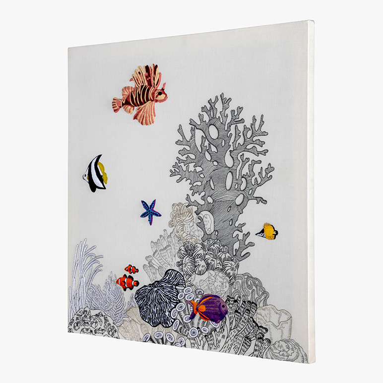 framed textile artwork with fish and coral reefs