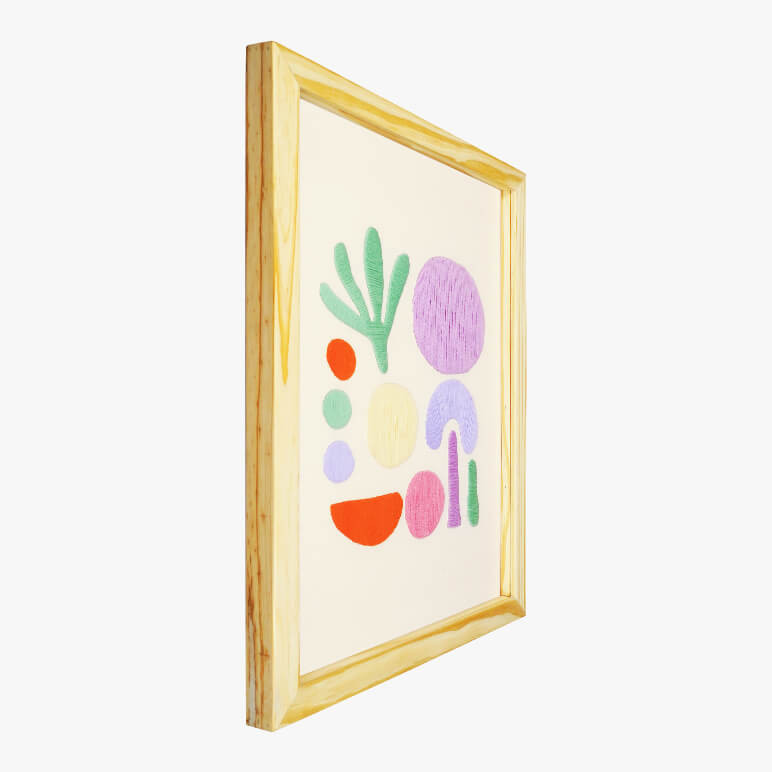 Left angle view of a wooden framed pastel abstract wall art