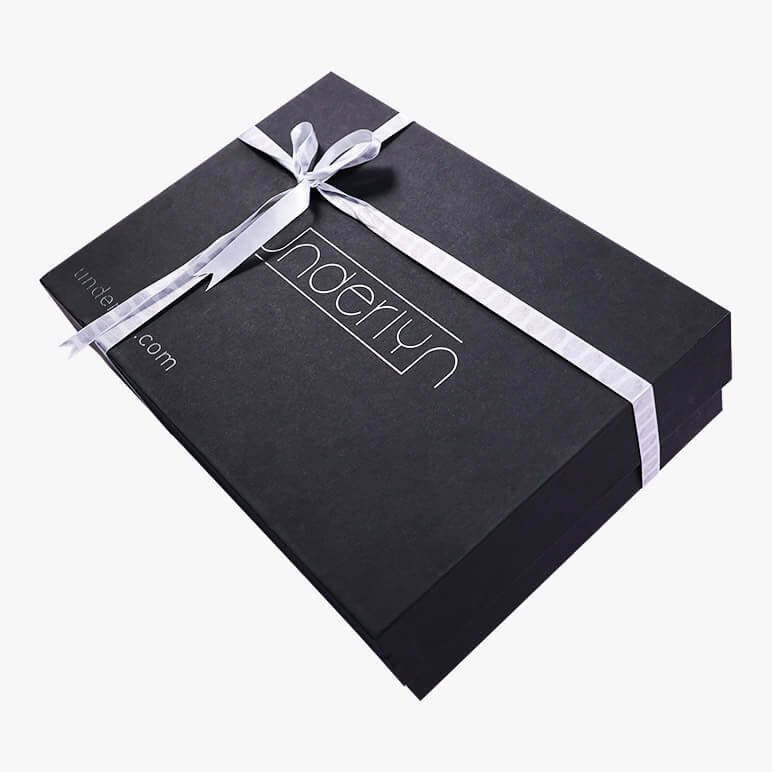premium black gift box with a silver ribbon tied on top