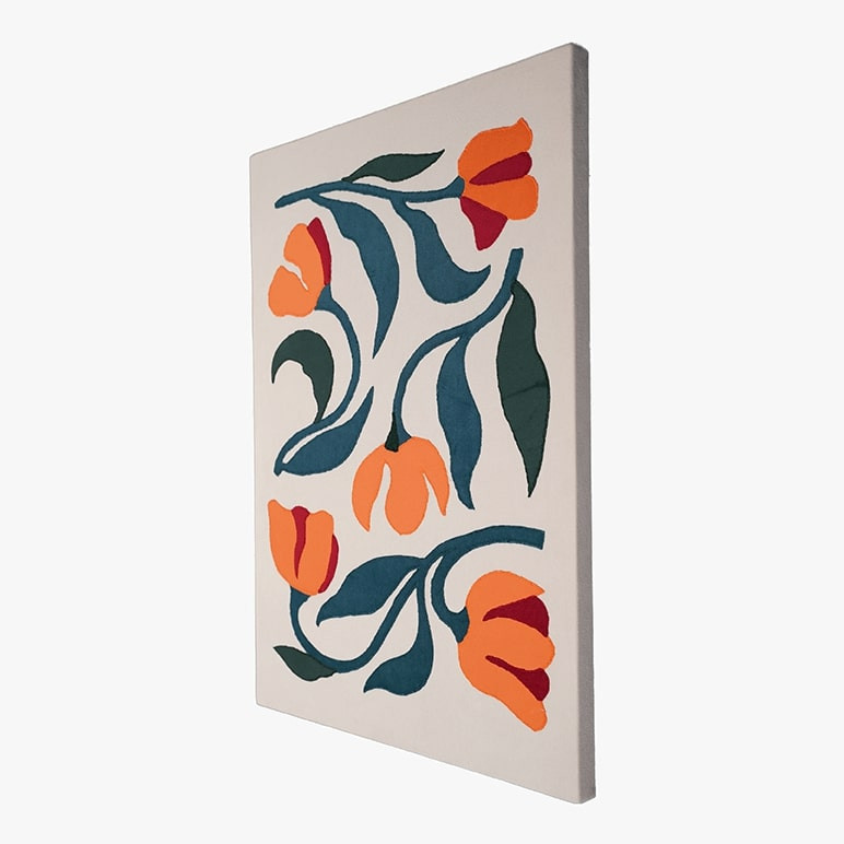 Right angle view of a tulip wall art piece that has been canvas framed