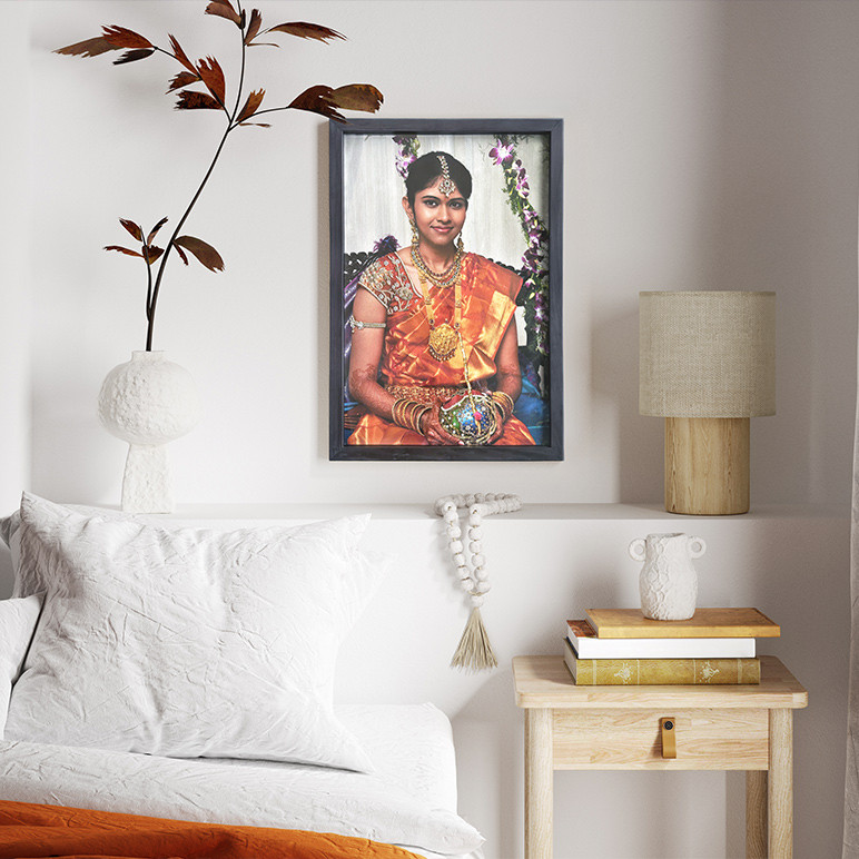  a lady's custom portrait seen displayed in a bedroom