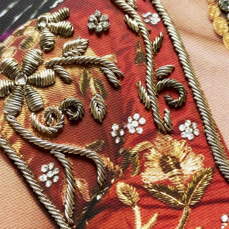 close up view showing the embroidered details on a custom wedding portrait