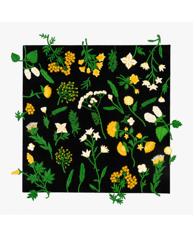 framed black canvas floral wall art in thread with bright yellow and white flowers and green leaves