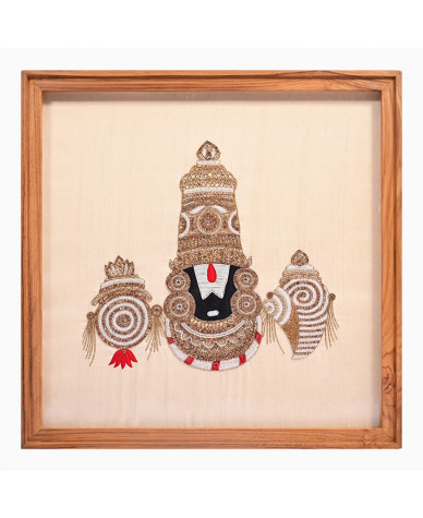 Textile artwork of Lord Venkateswara, hand-embroidered using beads, crystals, French purl wire and silk thread over a cream raw silk background, framed in wood