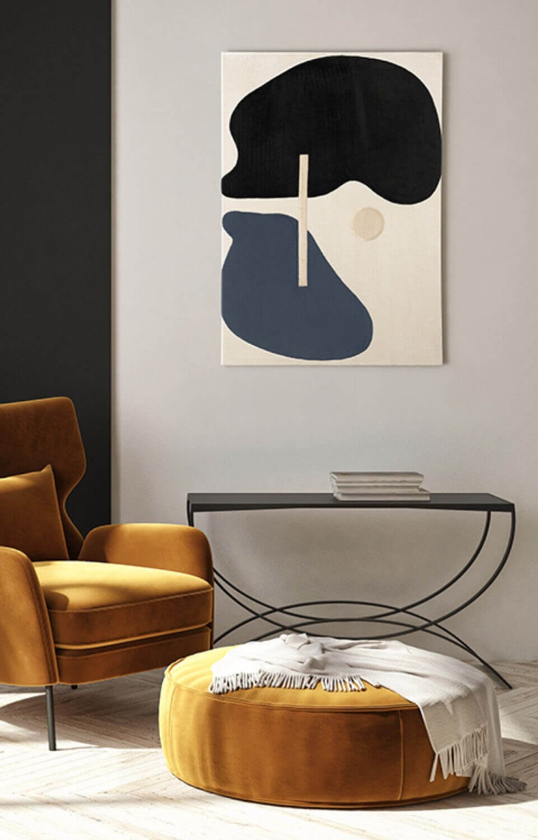 framed abstract patchwork fiber art in modern boho living room